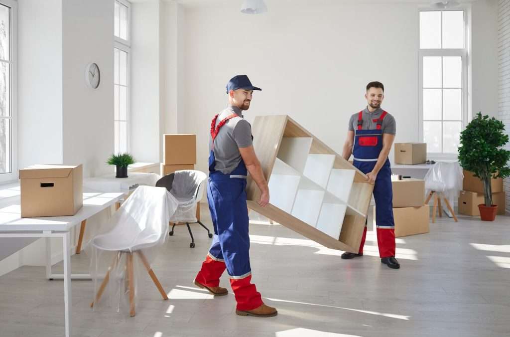 workers removing furniture from property